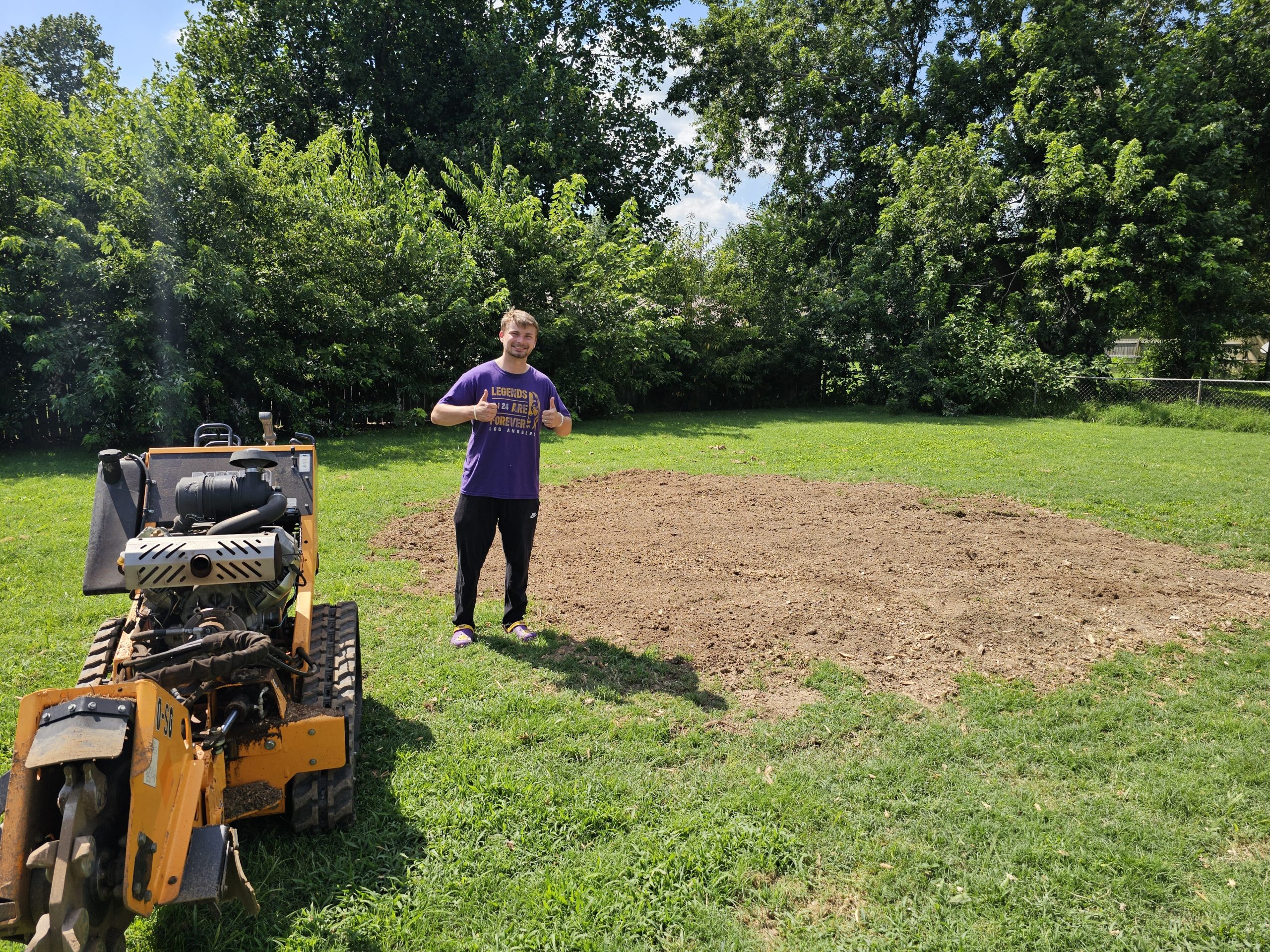 Stump ground flush with the ground, job complete